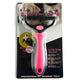 Pet grooming comb with pink handle on packaging with dog and cat.
