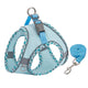 Pet harness and leash set with blue and gray pattern on a white background