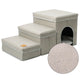 Pet staircase with cushioned steps and a small pet house.