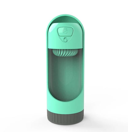 A blue portable pet water bottle feeder with an attached drinking bowl, designed for outdoor use.