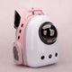 Pink and white pet backpack with a clear front on a light pink background