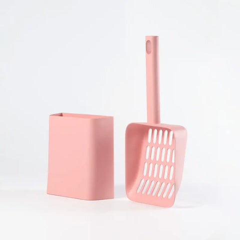 Pink cat litter scoop and its container on white background view.
