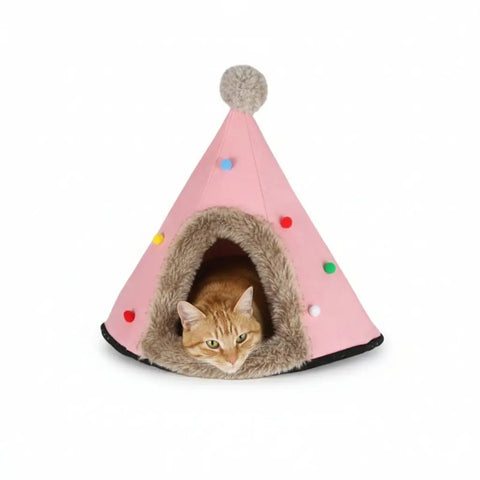 Pink cone-shaped pet house with a cat peeking out.