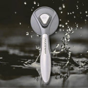 Pink key pet grooming comb with water droplets and 'PawVortex' branding