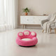 Pink paw-shaped pet bed on white background view.
