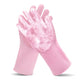 Pink silicone pet scrubbing and grooming gloves for dog bathing.