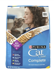 Purina Cat Chow Complete cat food package with woman and cat.