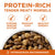 Close-up of Purina ONE dry dog food kibble bowl featuring protein-rich tender meaty morsels for immune system, radiant coat, and energy.