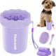 Purple portable dog paw cleaner cup set shown alongside a small dog and grooming accessories.