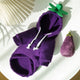 Purple hoodie with a green stem on a white surface.