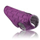 Purple quilted dog coat on a white background.