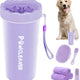 Purple silicone dog paw washer cup set with matching brush and towels next to a Golden Retriever.