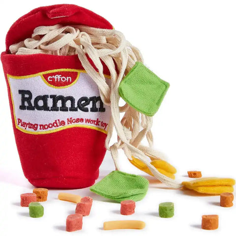 Red cup of ramen plush dog nose work toy with pull-out fabric noodles and interactive treat pockets.