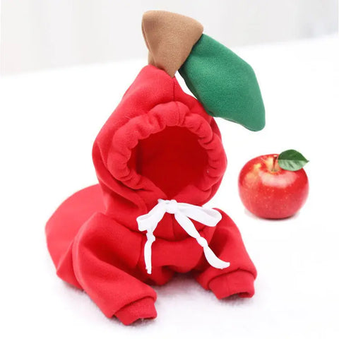 Red apple-shaped costume with green leaf and brown stem on white.