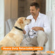 A man kneeling next to a yellow Labrador retriever using a heavy-duty retractable dog leash rated for dogs up to 115 lbs