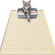 Beige non-slip silicone cat litter mat with tabby cat stepping out of litter box