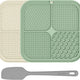 Mint green and beige textured silicone pet licking mats with a grey food spatula.