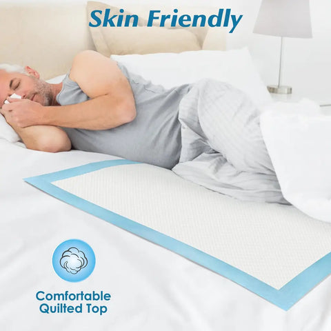 Senior man sleeping comfortably in bed on a skin-friendly, quilted disposable underpad.