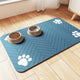 Slate blue waterproof pet food mat featuring a modern herringbone pattern and paw prints.