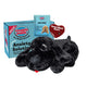 Snuggle Puppy behavioral aid anxiety solution featuring a black plush dog and a red SmartBeat Heart simulator.