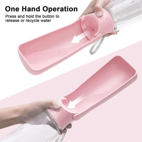 Close-up of one-hand button operation to release and recycle water in pink dog bottle