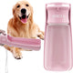 Pink portable dog water dispenser bottle held in front of a Golden Retriever
