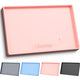 Pastel pink Ukeetap silicone dog and cat food mat with raised lips to prevent liquid overflow.