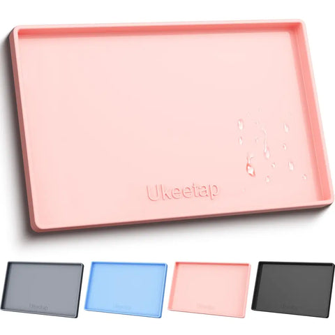 Pastel pink Ukeetap silicone dog and cat food mat with raised lips to prevent liquid overflow.