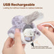 Hands connecting USB charging cable to the removable battery pack inside the plush bird cat toy