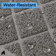 Close-up of water droplets sitting on top of a water-resistant mesh cat litter mat