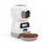 White and gray pet food dispenser with a bowl of kibble on a white background