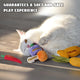 A fluffy white cat lying on its back, playing and biting a soft purple blueberry Pawsible catnip toy in the sunlight.