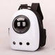 White pet carrier with black accents on a light pink background