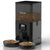 White pet food dispenser with 'Voluas' branding, filled with pet food, and two bowls