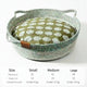 Woven rattan pet bed with natural materials and breathable design.
