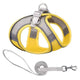 Yellow and gray dog harness with a leash on white background.