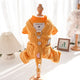 Yellow dog outfit with buttons and heart design on mannequin.