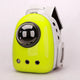 Yellow pet carrier with a black sphere on a white background