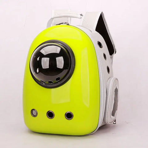 Yellow pet carrier with a black sphere on a white background